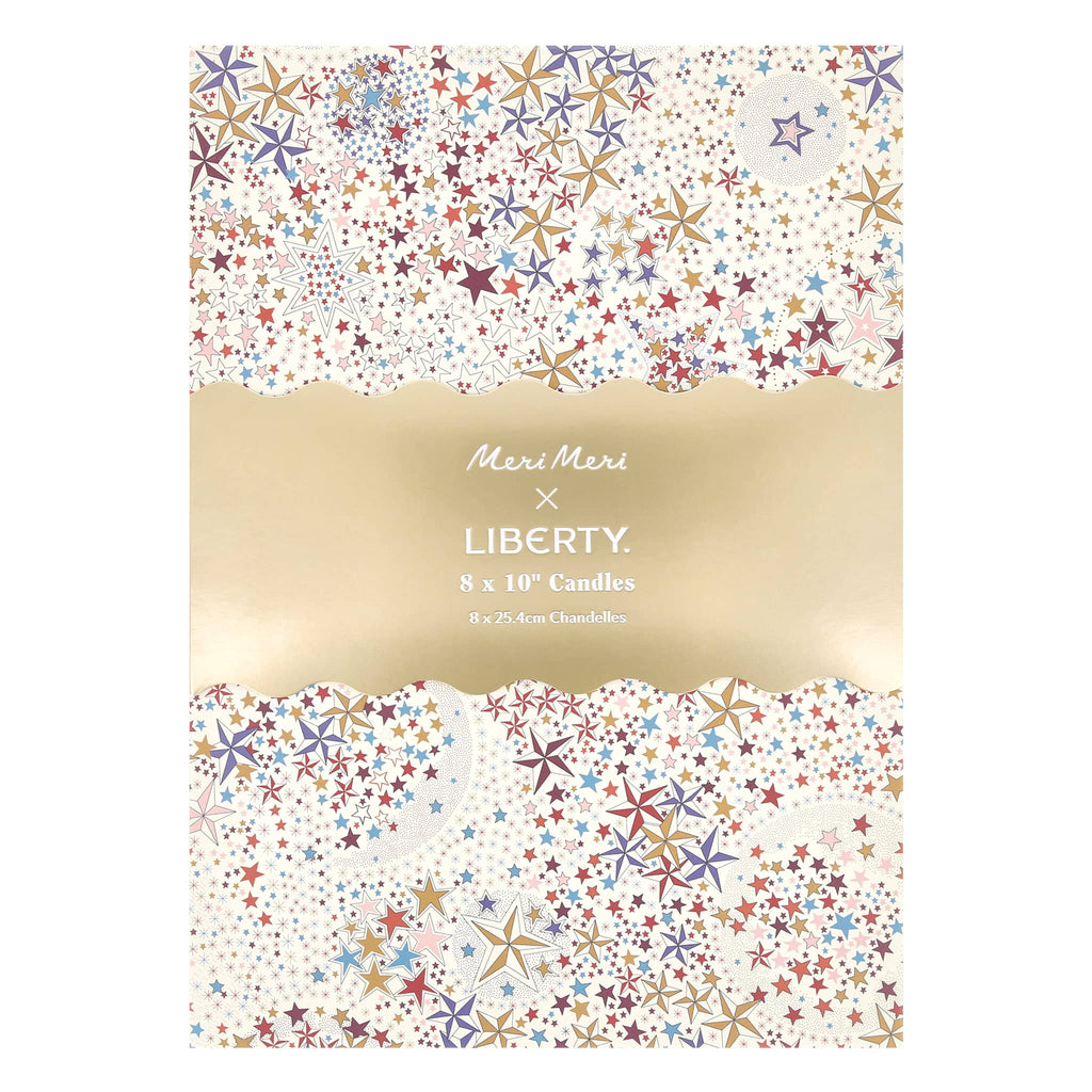 Packaging of Meri Meri x Liberty candles with star pattern and gold band.