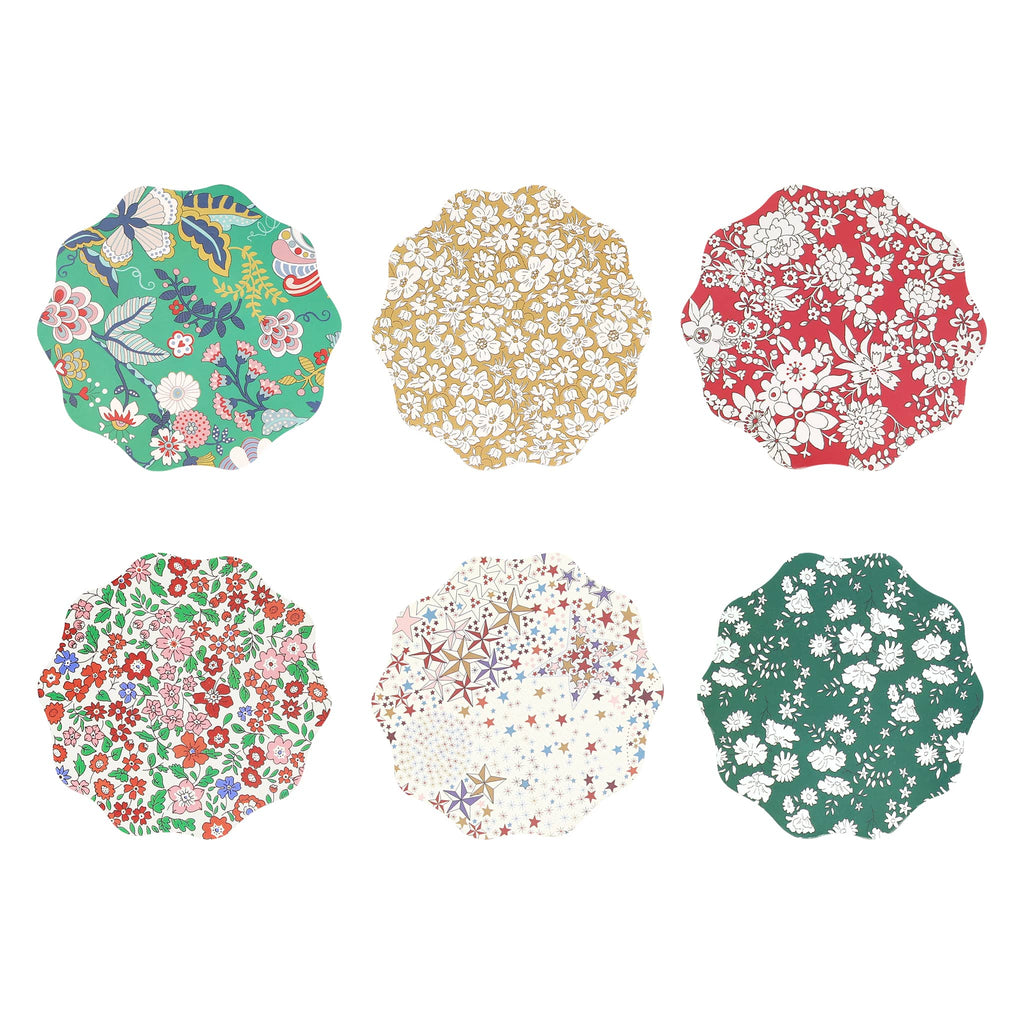 Set of six floral patterned coasters on a white background.