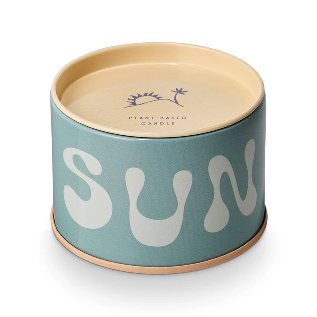 MiscMatch Sun Wash scented soy wax candle in tin with "sun" on it and lid.