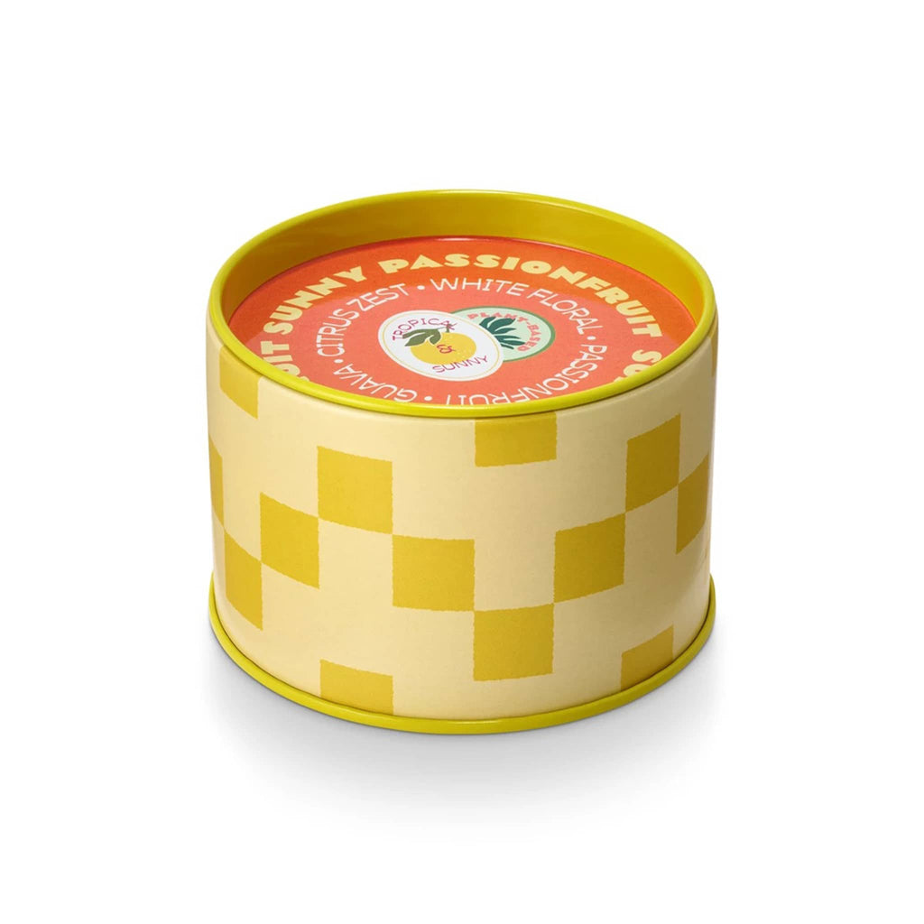 MiscMatch sunny passionfruit scented soy wax candle in yellow farmers market tin with lid.