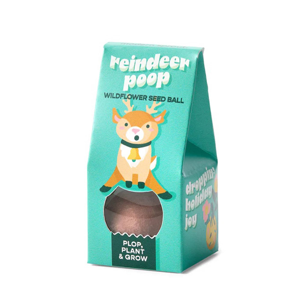 Package of reindeer poop wildflower seed ball with a cartoon reindeer on a teal green background.