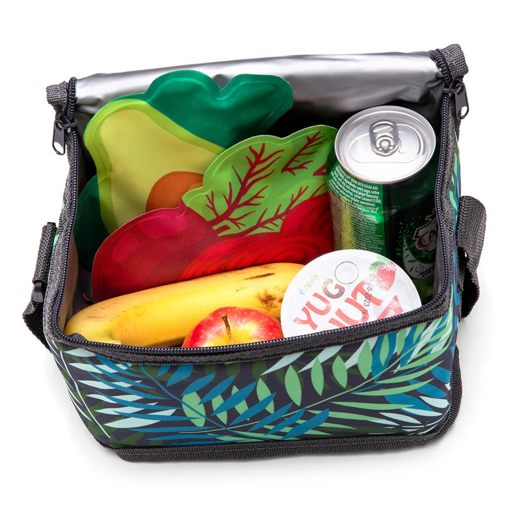 Monkey Business Icepadz, soft ice packs, set of two in avocado and radish designs, in an insulated cooler bag with a banana, an apple, yogurt and a can of ginger ale.