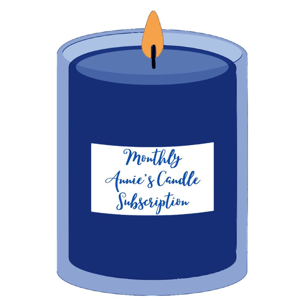 Illustration of a blue candle with a white label that says "monthly annie's candle subscription".