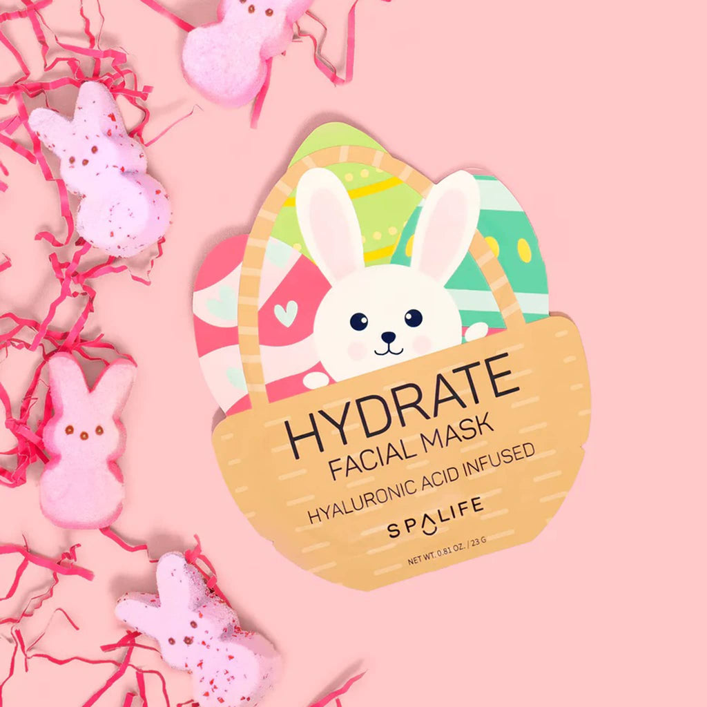 SpaLife Hydrate Facial Mask in pouch packaging with illustration of Easter bunny in basket with colorful eggs.