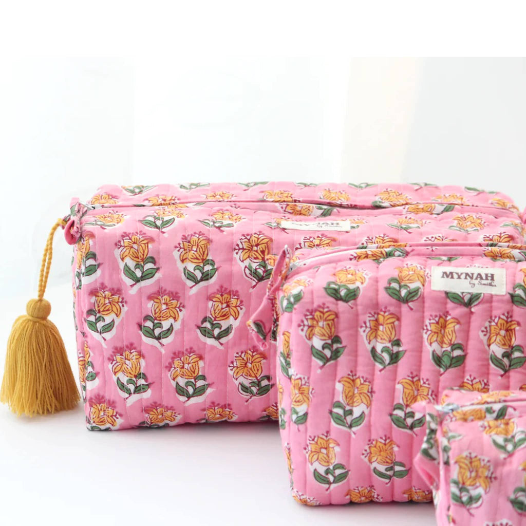 MYNAH by Smitha Bubblegum Motif print large quilted travel makeup pouch with yellow tassel.