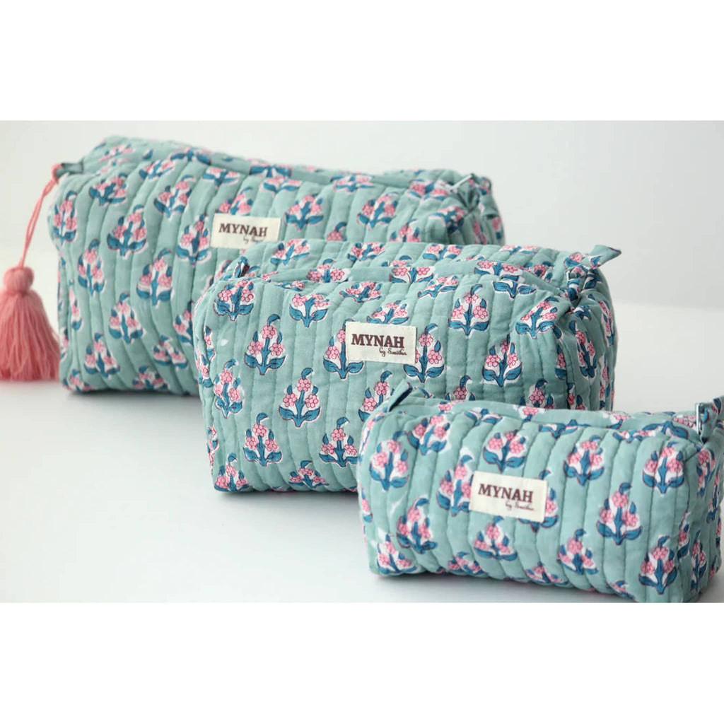 MYNAH by Smitha Eucalyptus print large, medium and small quilted travel makeup pouches, front angle view.