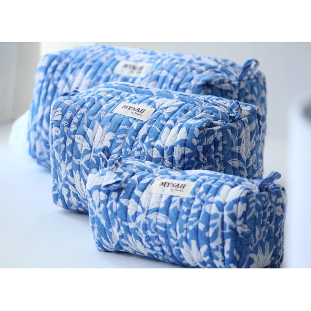 MYNAH by Smitha Old Blue Floral print large, medium and small quilted travel makeup pouches, front angle view.