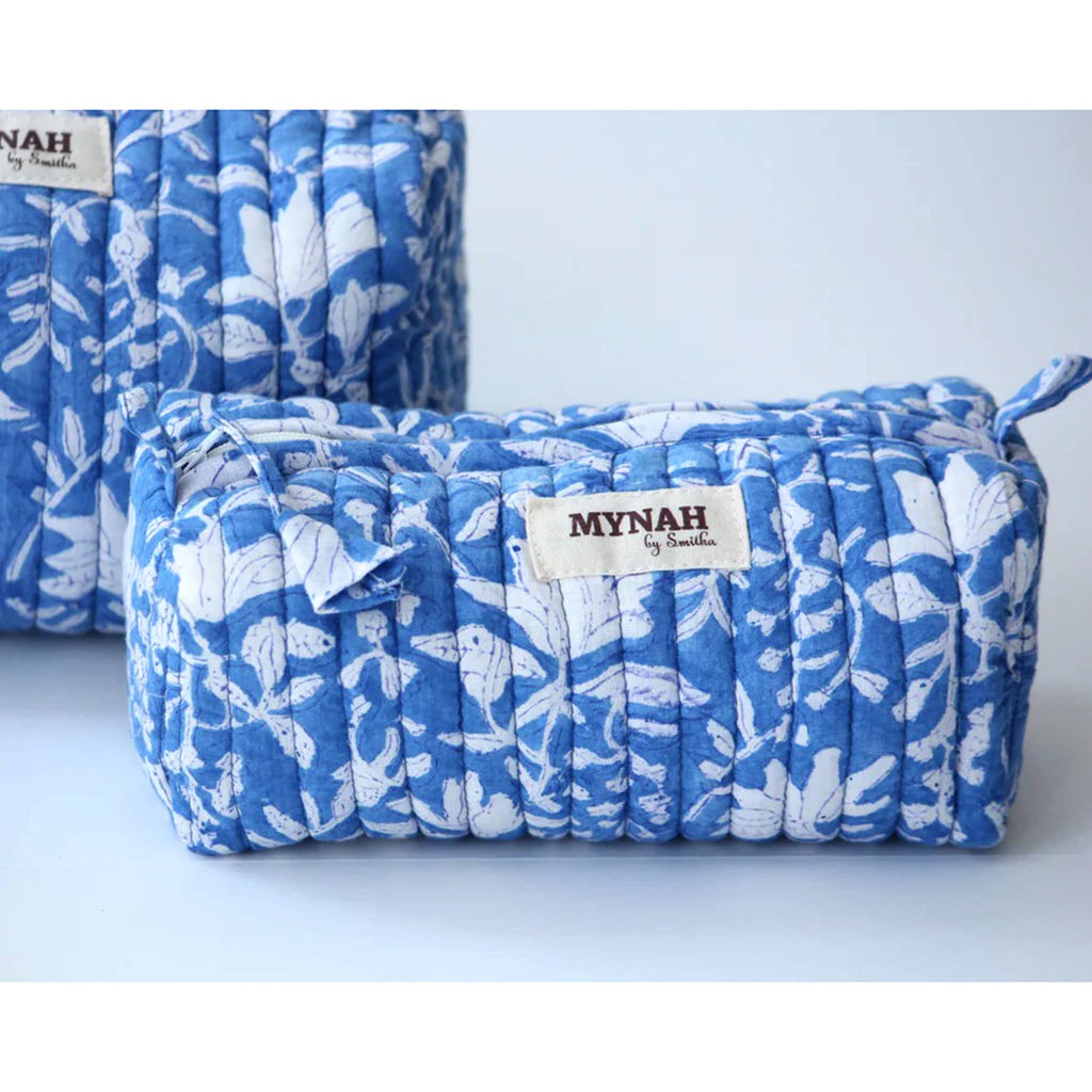 MYNAH by Smitha Old Blue Floral print small quilted travel makeup pouch, front view.