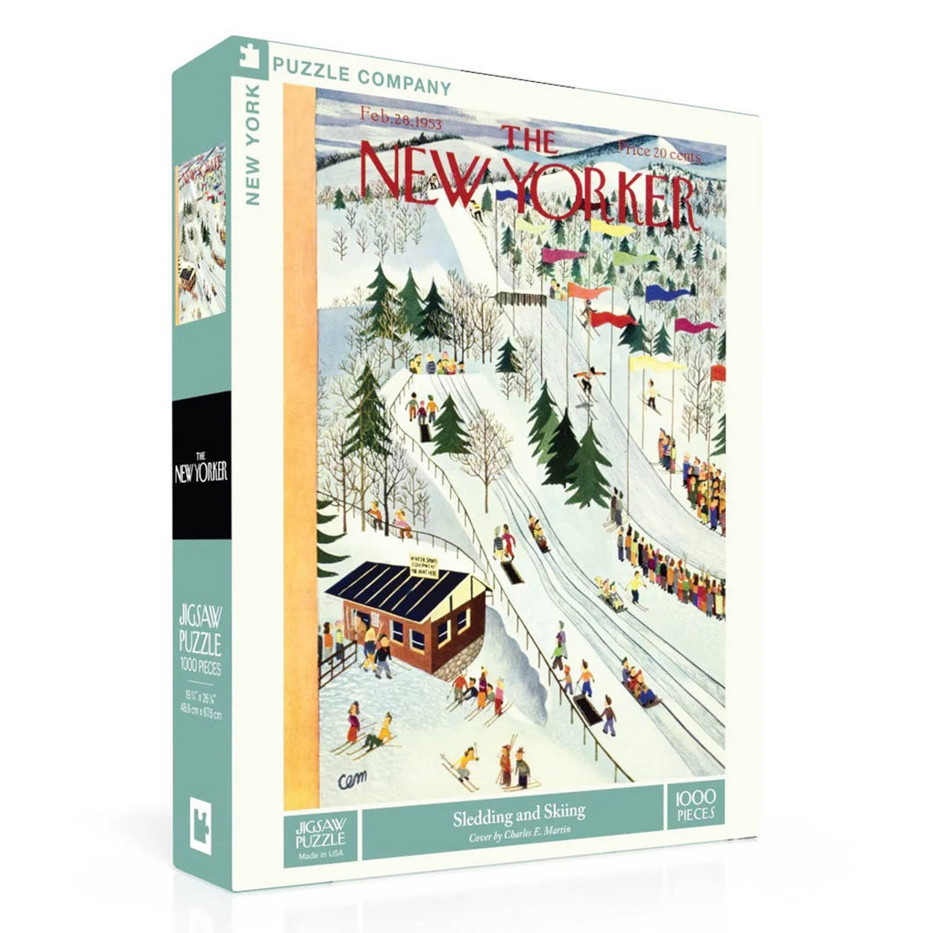 Jigsaw puzzle box featuring a winter scene with people sledding and skiing.