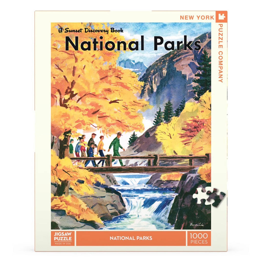 Jigsaw puzzle box featuring a scenic illustration of a national park with people on a bridge over a waterfall.