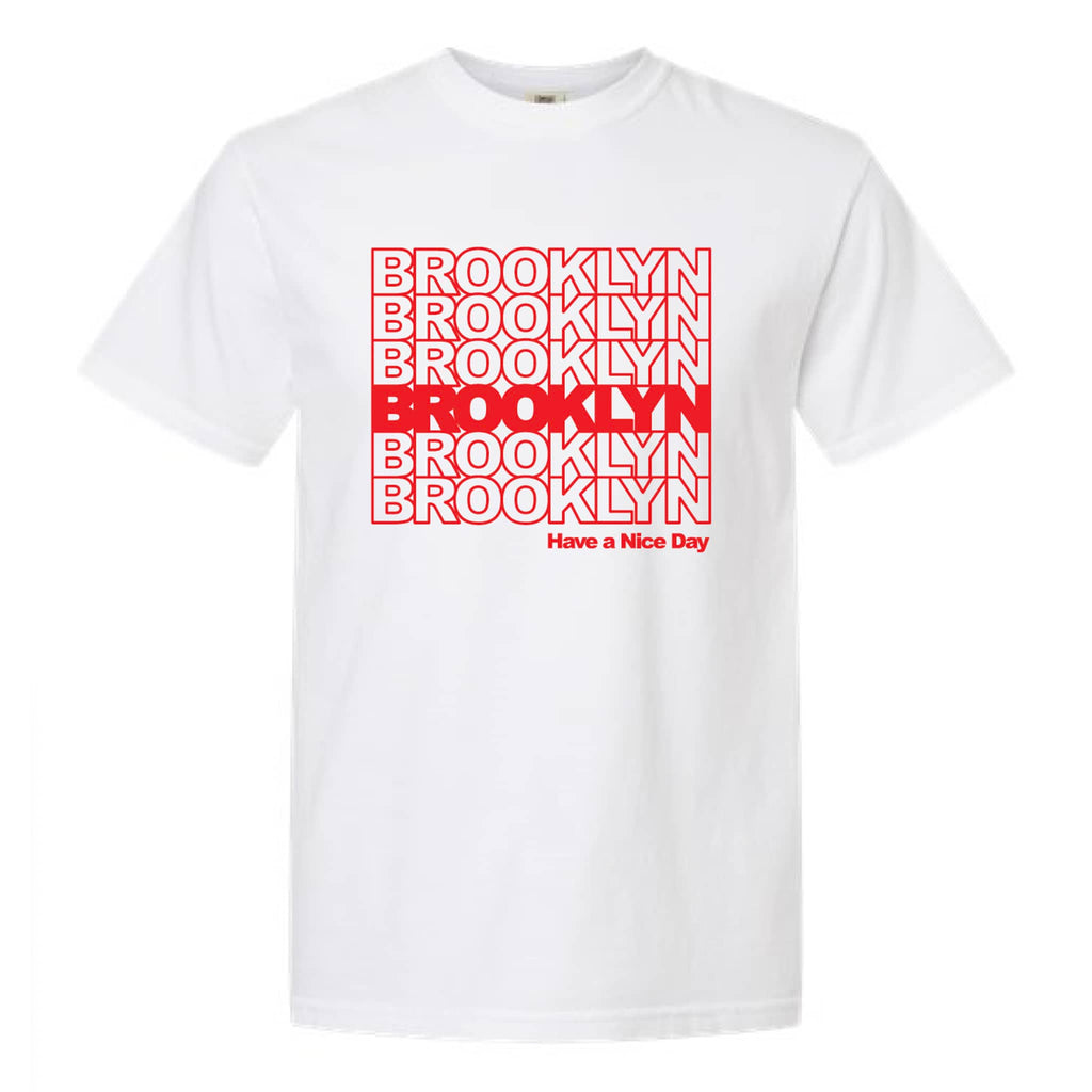 Norman Roscoe white tee with "brooklyn" in red repeating letters and "have a nice day" at the bottom.