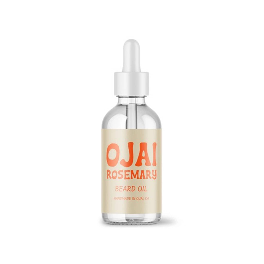 Ojai Essentials Rosemary and Palo Santo scented all-natural beard oil in glass dropper bottle packaging.
