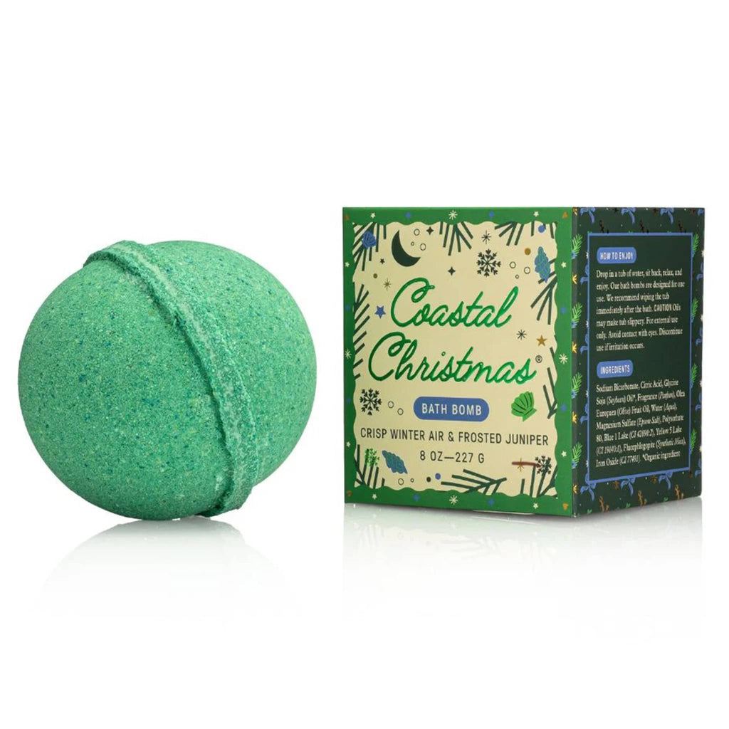 Green bath bomb with 'Coastal Christmas' packaging on a white background.
