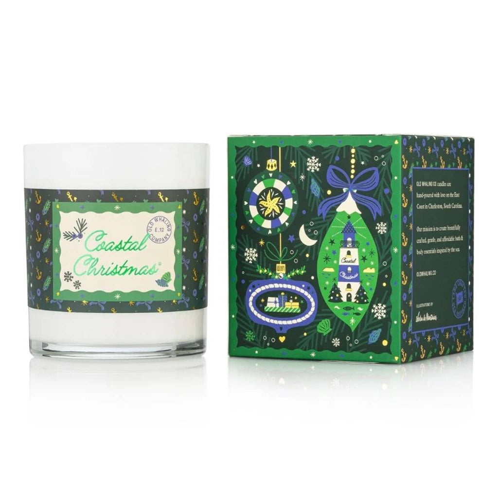 Coastal Christmas candle with decorative packaging on a white background.