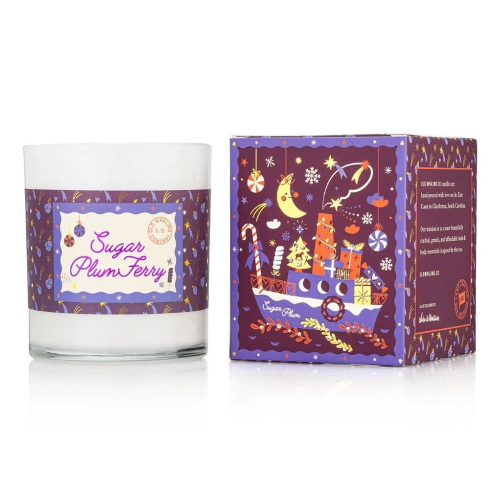 Sugar Plum Ferry Candle with decorative label and packaging on a white background.