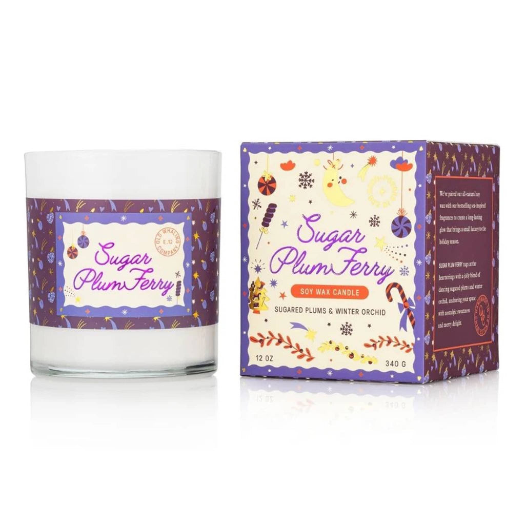 Sugar Plum Ferry Candle with decorative label and packaging on a white background.