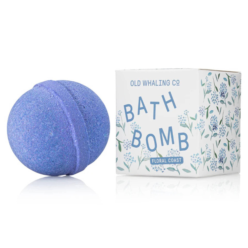 Old Whaling Company Floral Coast 8 ounce blue bath bomb fizzer next to gift box with blue hydrangea floral print.