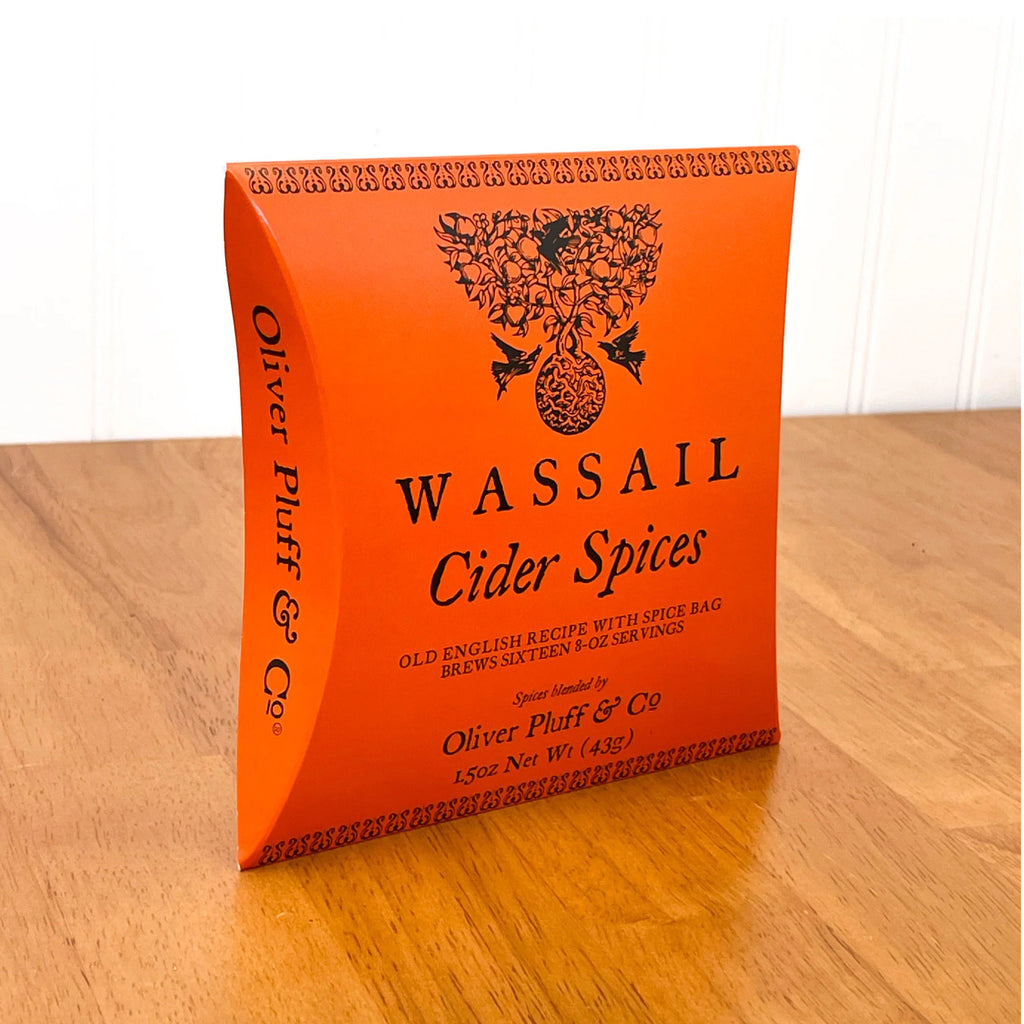 Oliver Pluff Cider Spices Wassail Cocktail Kit in orange packaging, front view.