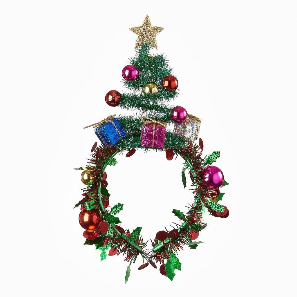 Christmas headband decorated with plastic holly, baubles, gift boxes and a gold star on top of a spiral tree on top.