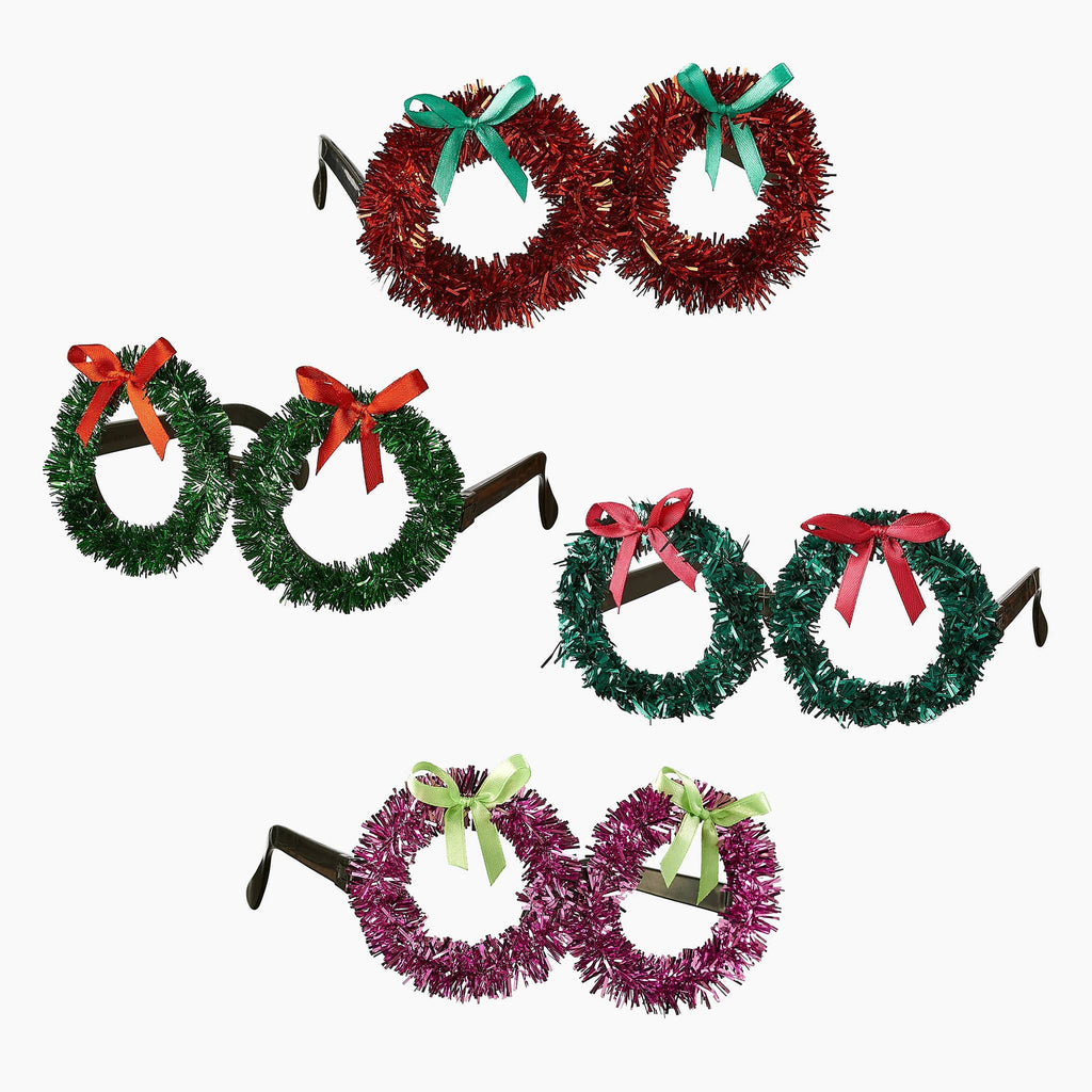 4 pairs of holiday party glasses with decorative wreaths and bows on a white background.