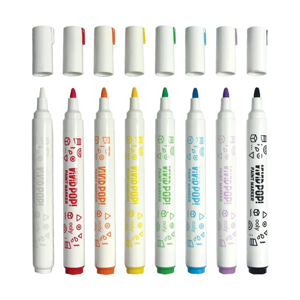 ooly vivid pop paint markers, set of 8 water based acrylic markers in rainbow colors, lined up side by side with caps off.
