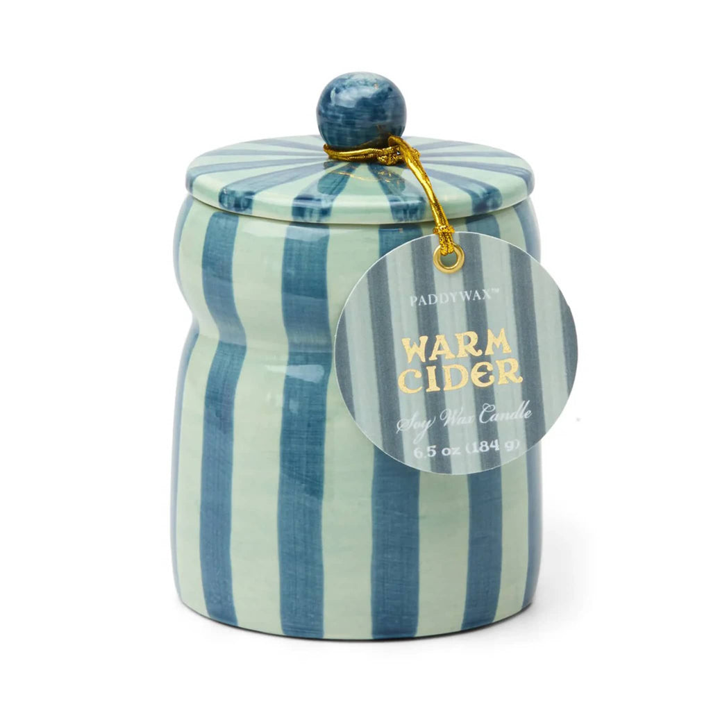 Warm Cider candle in ceramic jar with blue and teal stripes, on a white background.