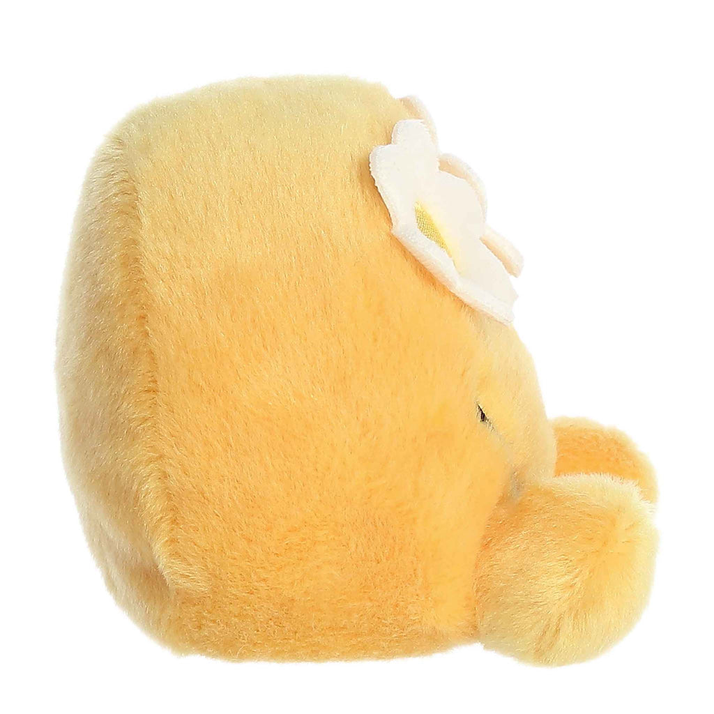 Palm Pals x SmileyWorld flower yellow smiley face plush toy, side view.