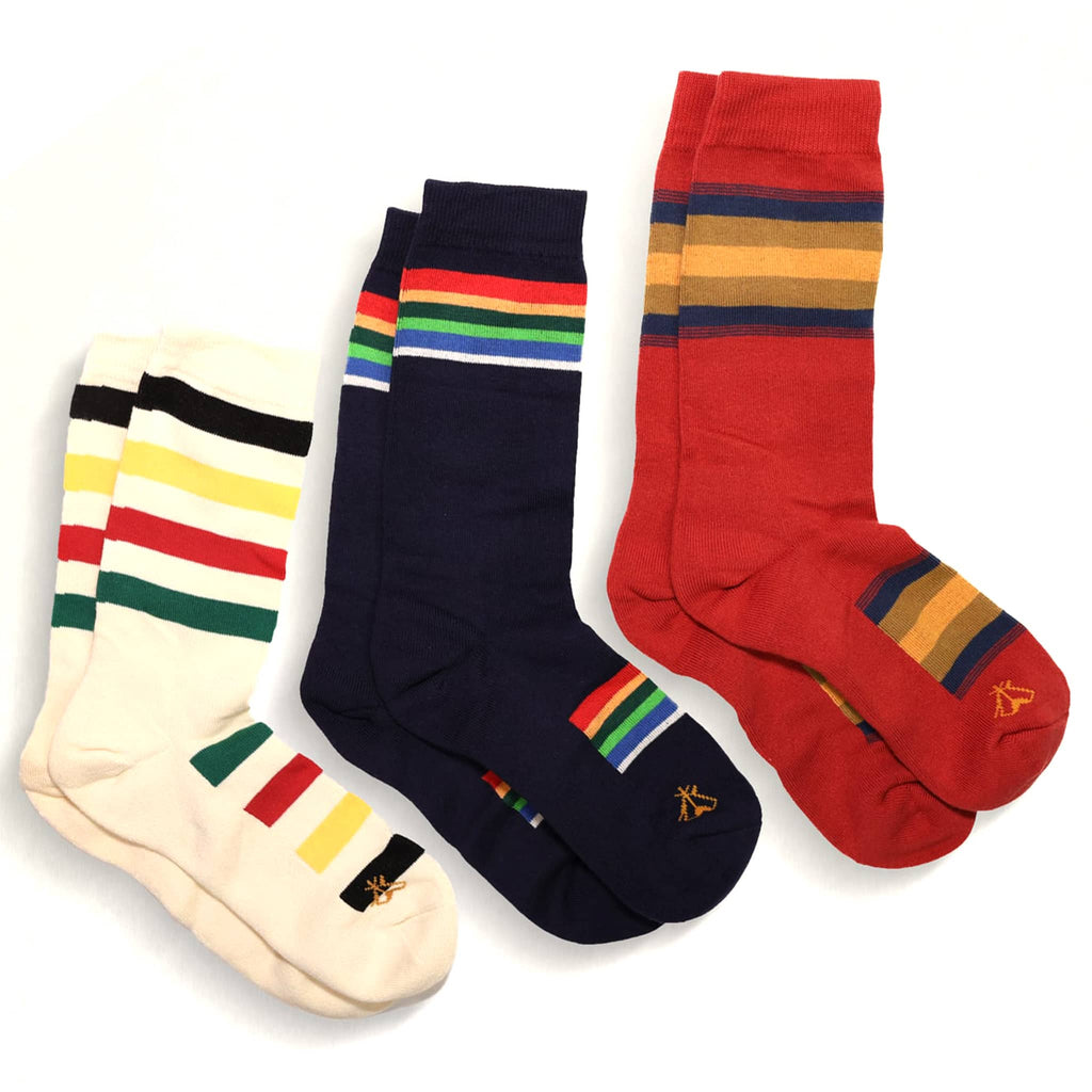 Three pairs of colorful striped socks on a white background.