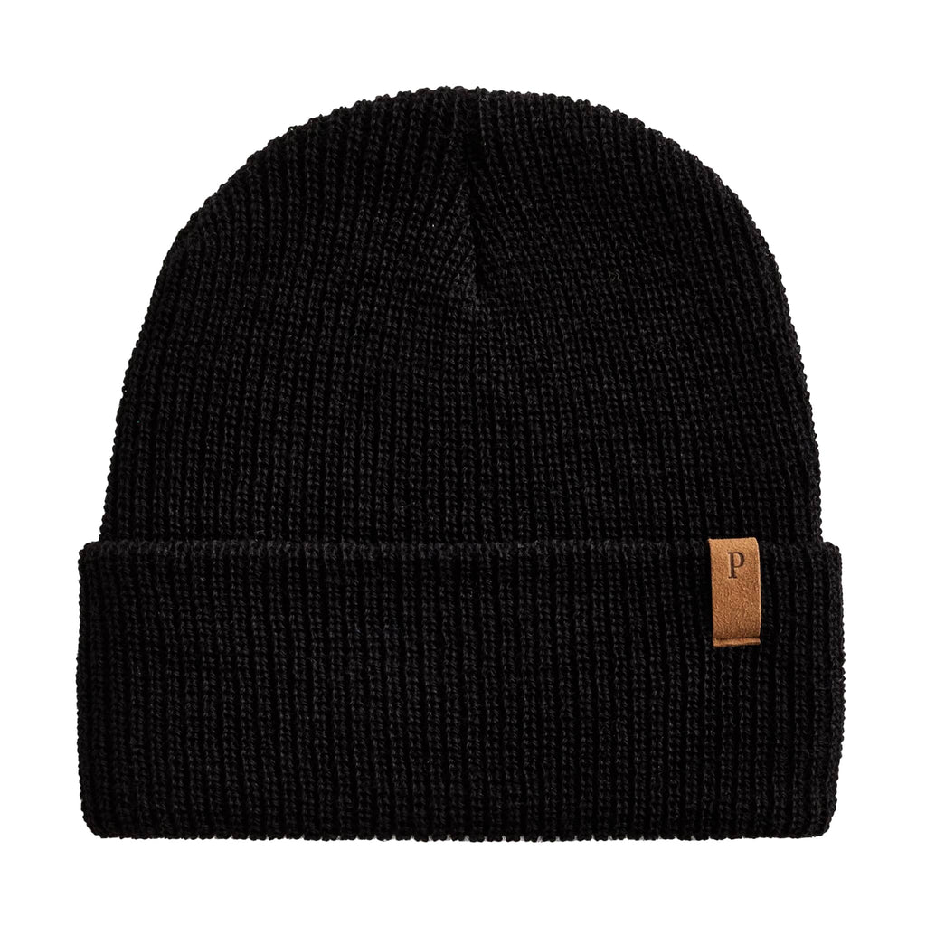 Black knit watch cap with a Pendleton brand leather logo strap, on a white background.