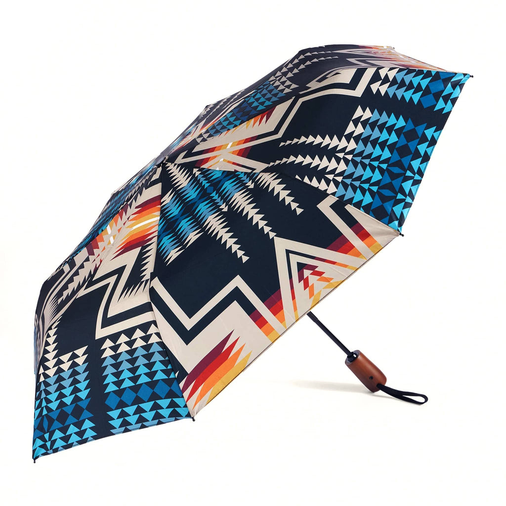 Umbrella with a colorful geometric pattern on a white background.
