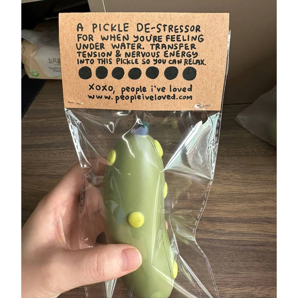 People I've Loved Pickle Stress Ball in packaging, back view.