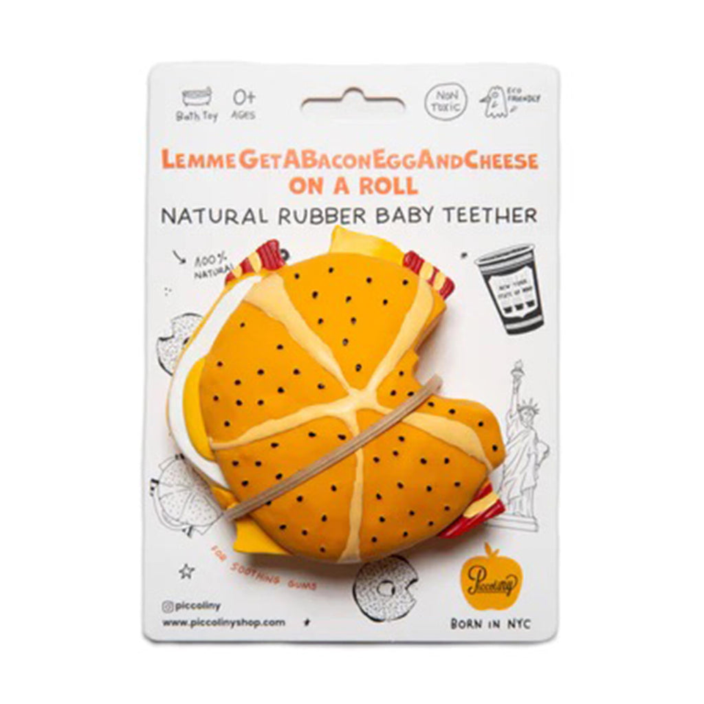 PiccoliNY Lemmegetabaconeggandcheese on a roll natural rubber baby teether on card packaging.