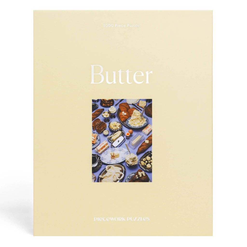 Piecework 1000 piece Butter jigsaw puzzle in box packaging, front view.