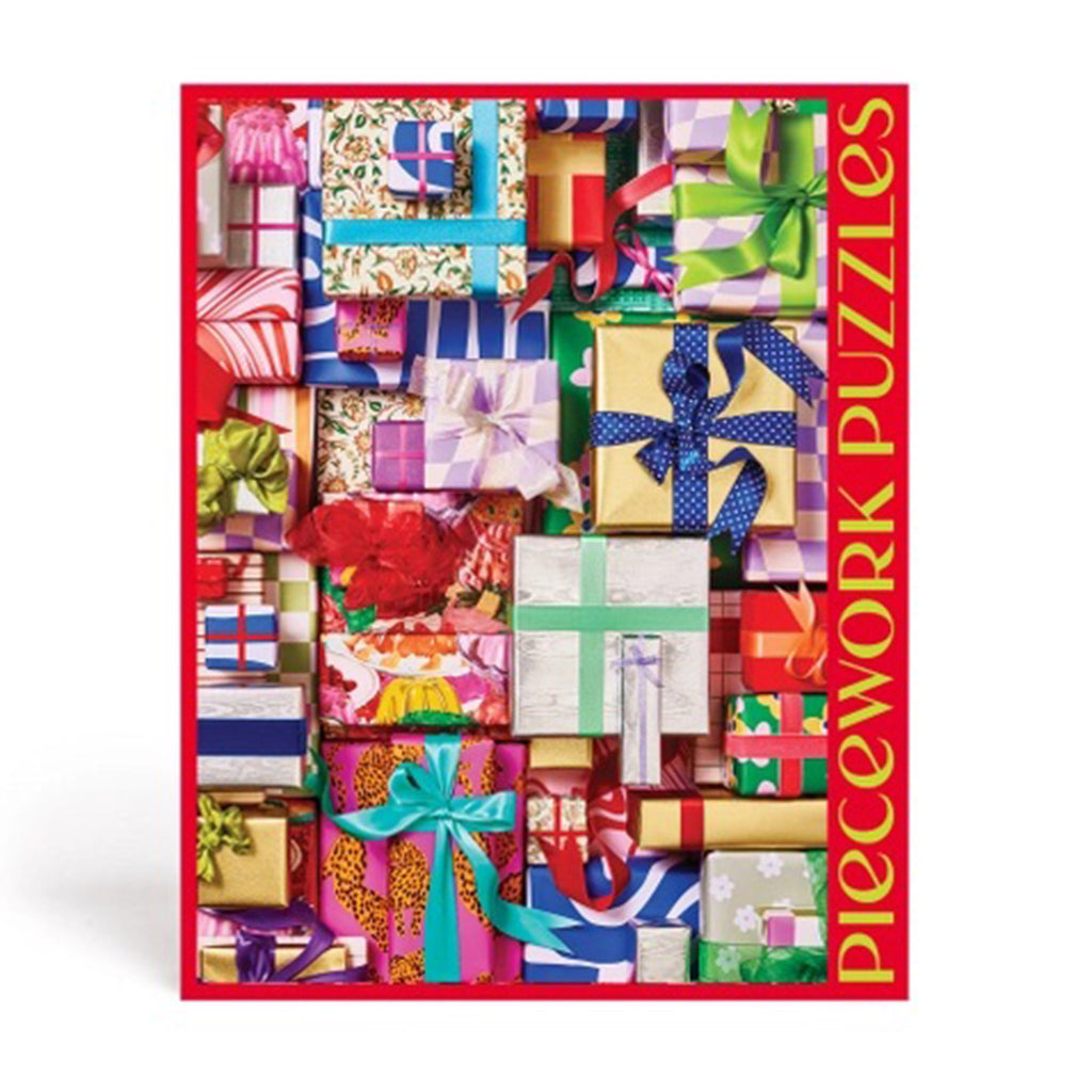 Piecework Puzzles 1000 Piece Fa La La La La holiday jigsaw puzzle in red box packaging, back view with puzzle image.