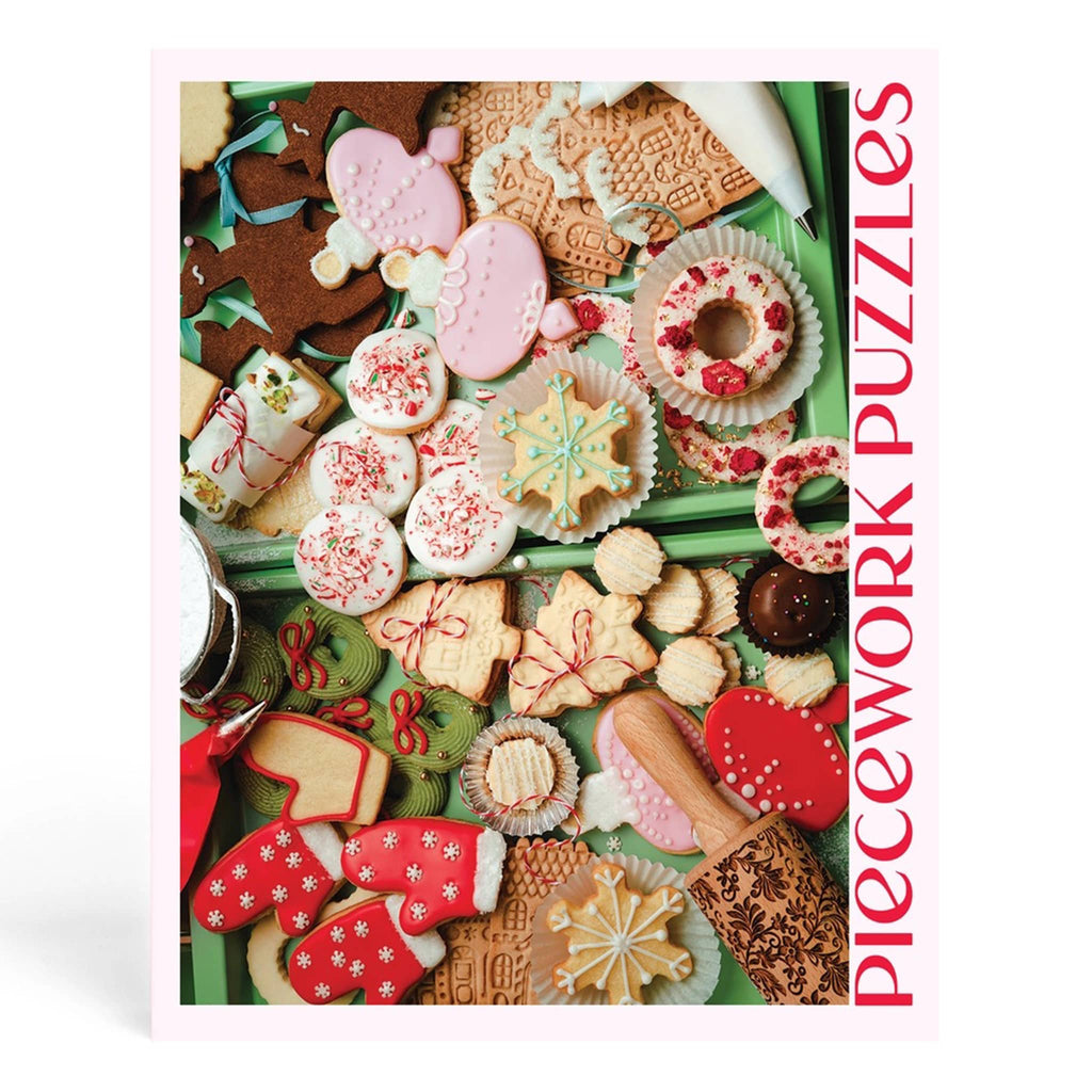 Back cover of a puzzle box with photo of various holiday decorated cookies and  'Piecework Puzzles'  on a white background.