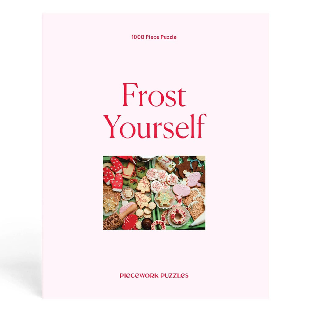 Pink puzzle box titled 'Frost Yourself' with a picture of cookies on a white background.