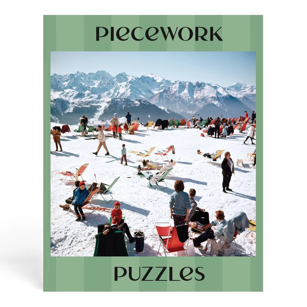 Piecework Puzzles 750 piece Verbier Vacation jigsaw puzzle featuring a Slim Aarons photo, in box packaging, back view showing the complete puzzle image, on a white background.