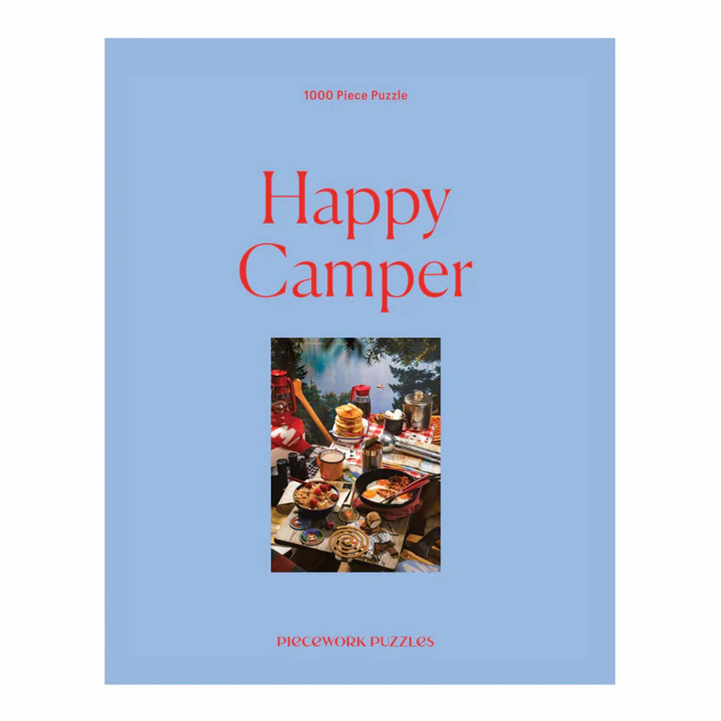 Box cover of 'Happy Camper' puzzle with a blue background and image of a camping scene.