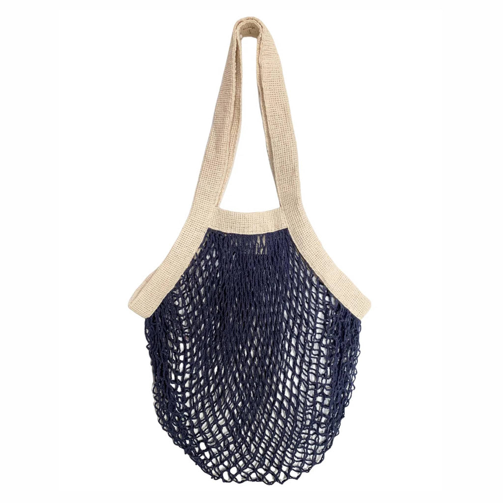 Pillowpia The French Market Bag in Navy, hanging.
