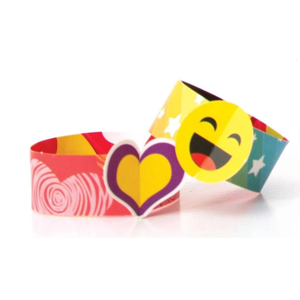 Playhouse Spread Kindness valentine cards with kids slap bracelets, bracelets with a heart and a smiley face shown.