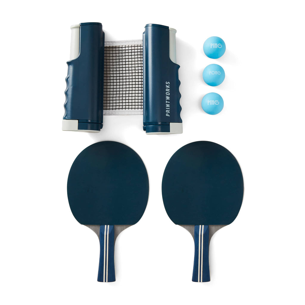 Printworks Ping Pong Portable Table Tennis Set contents, adjustable net, 3 balls and 2 paddles.