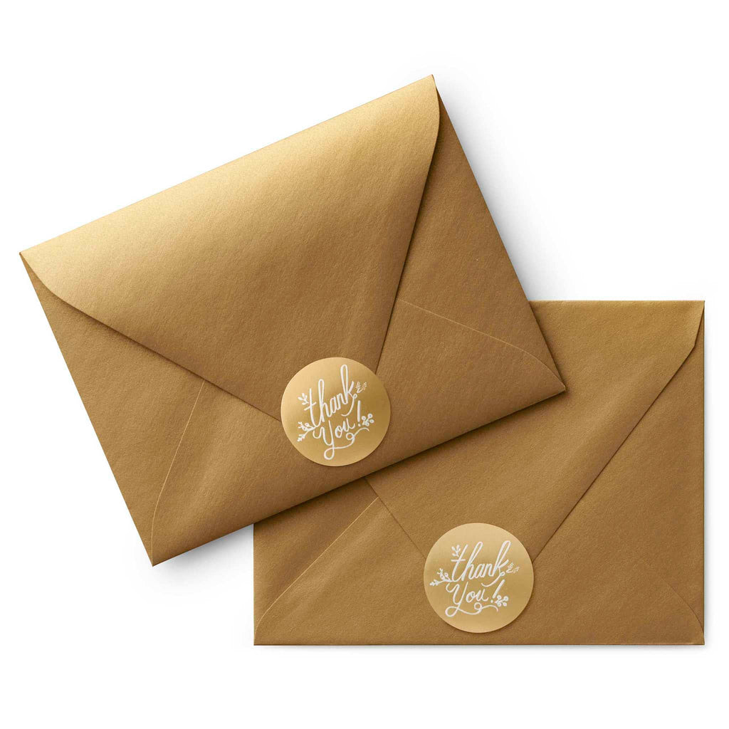 Rifle Paper Co, Gold Foil Thank You Envelope Seals on gold envelopes for scale.