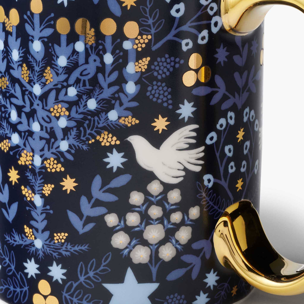 Detail of the Rifle Paper Laurel Menorah porcelain mug.
