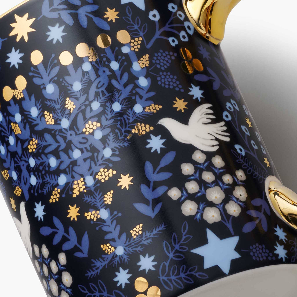 Detail of the Rifle Paper Laurel Menorah porcelain mug.