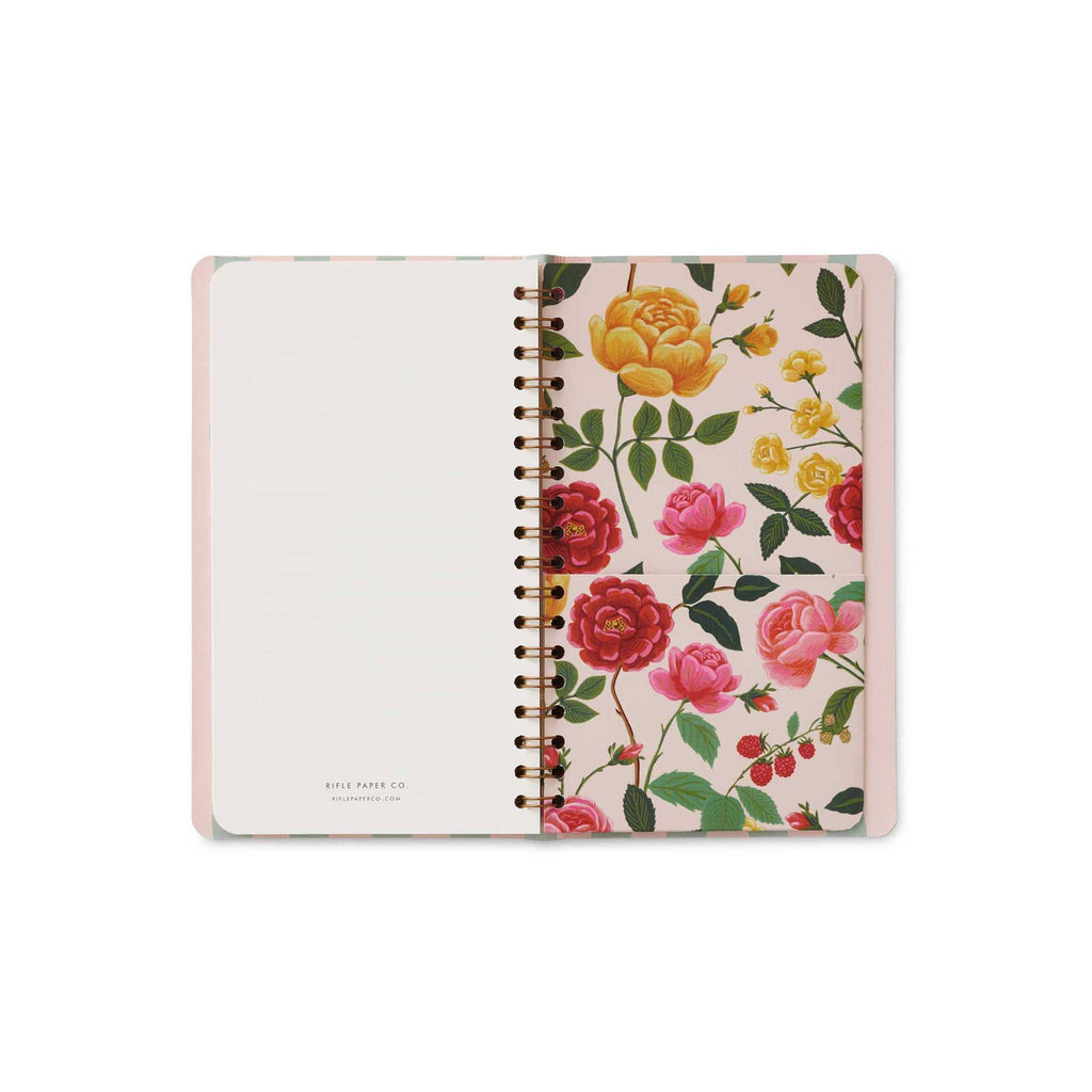 Rifle Paper Co. Roses 12-Month spiral bound pocket planner, inner back cover with storage pocket.