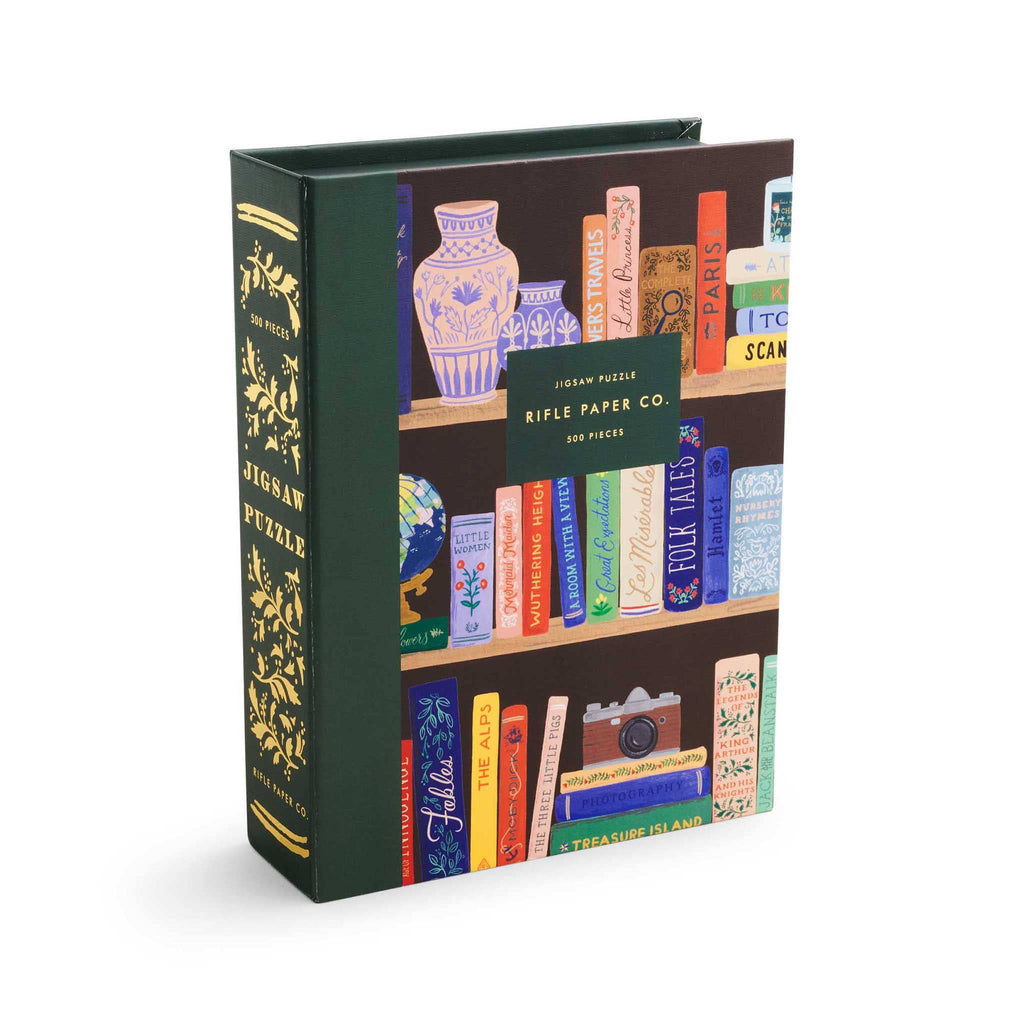 Rifle Paper Co. 500 Piece Bookshelf Jigsaw Puzzle in book box packaging, front angle view.