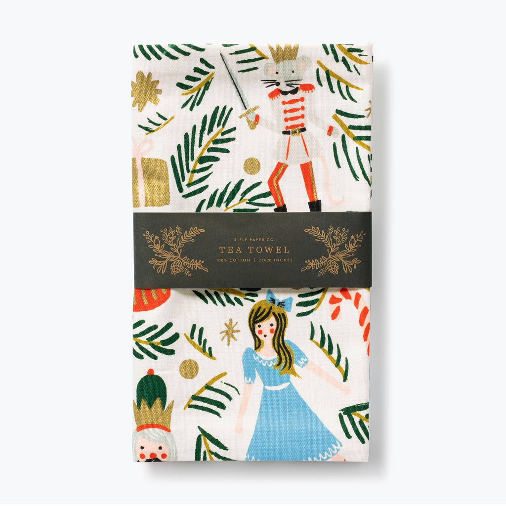 Rifle Paper Co. Christmas Tree Nutcracker cotton tea towel in packaging.