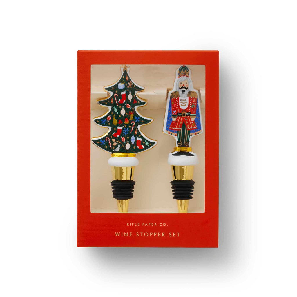 Rifle Paper Co. Nutcracker Porcelain Wine Stopper Set in box packaging.