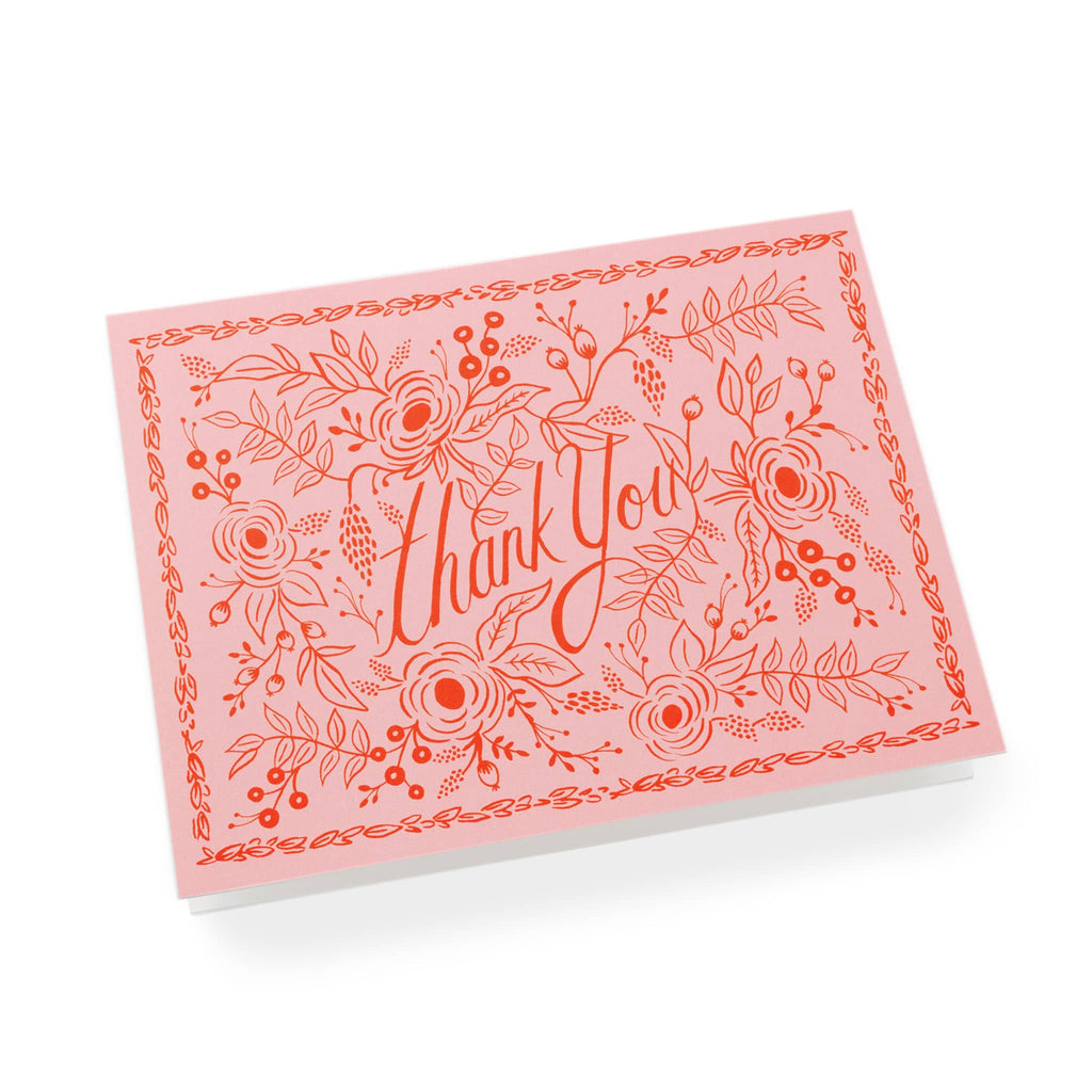 Rifle Paper Thank You card with red rose floral print on a pink background.