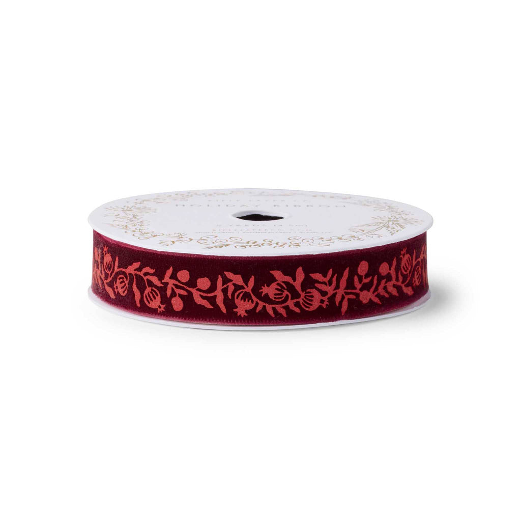 Rifle Paper Co. Christmastide pomegranate velvet ribbon on spool.